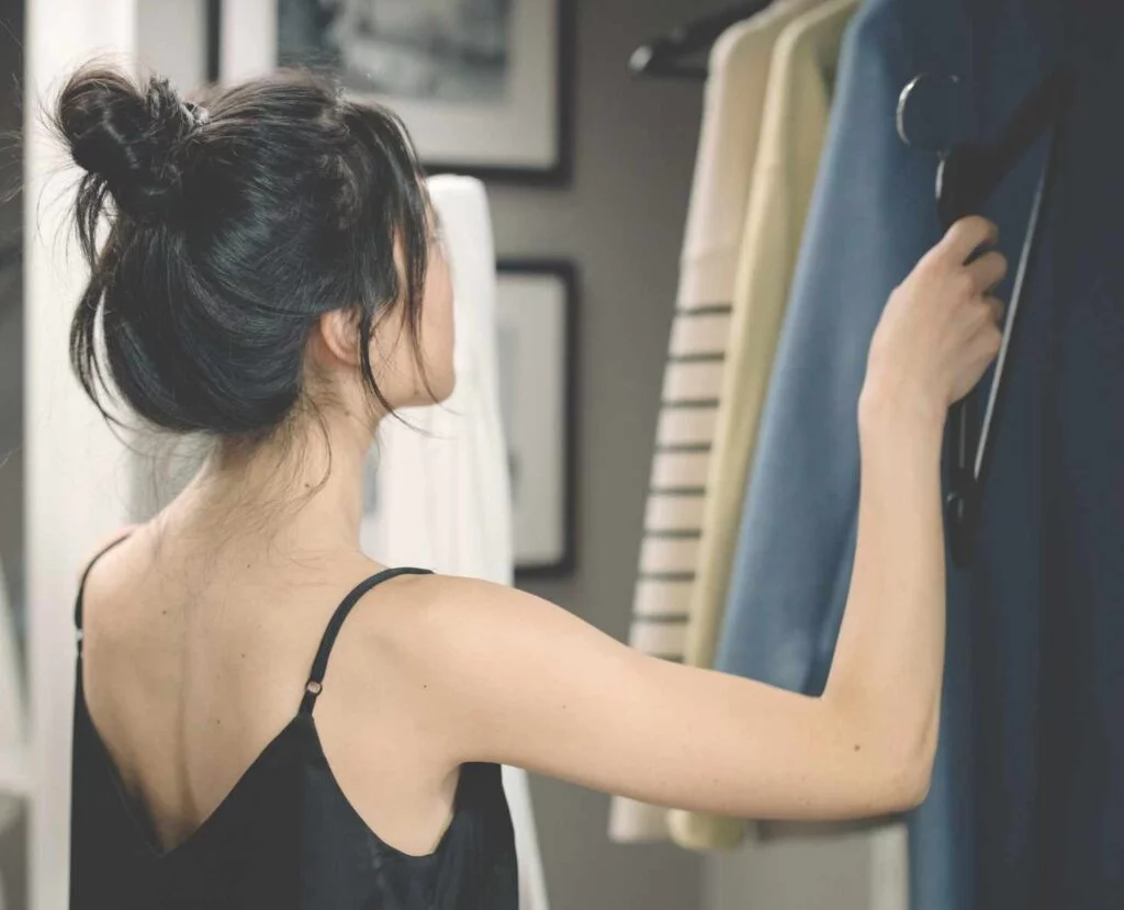 Deciding which clothes to hang in closet