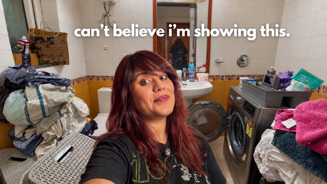 Aastha in her tiny laundry room before decluttering and reorganizing the overflowing baskets