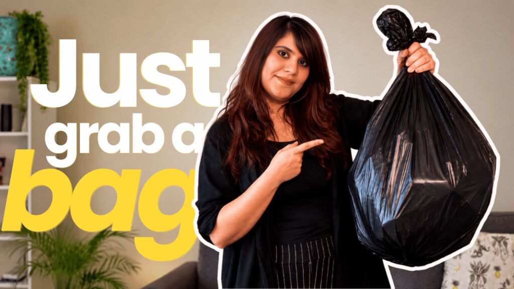 Aastha holds a filled rubbish bag beside the words “Just grab a bag” in the Trash Bag Therapy video thumbnail.